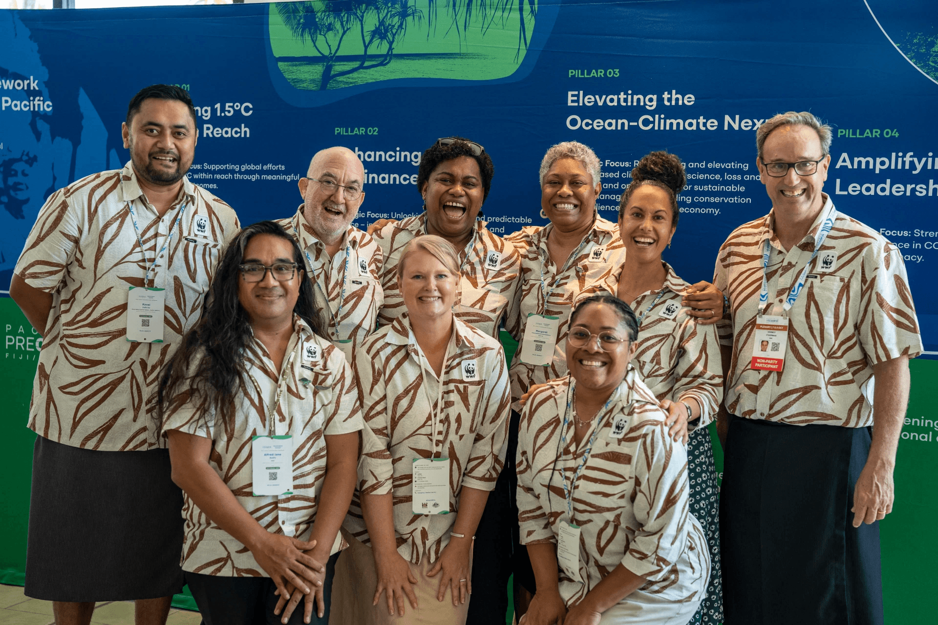A group of people pose for a photo at a climate conference. Members of WWF-Australia and WWF-Pacific delegation. Members of WWF-Australia and WWF-Pacific delegation