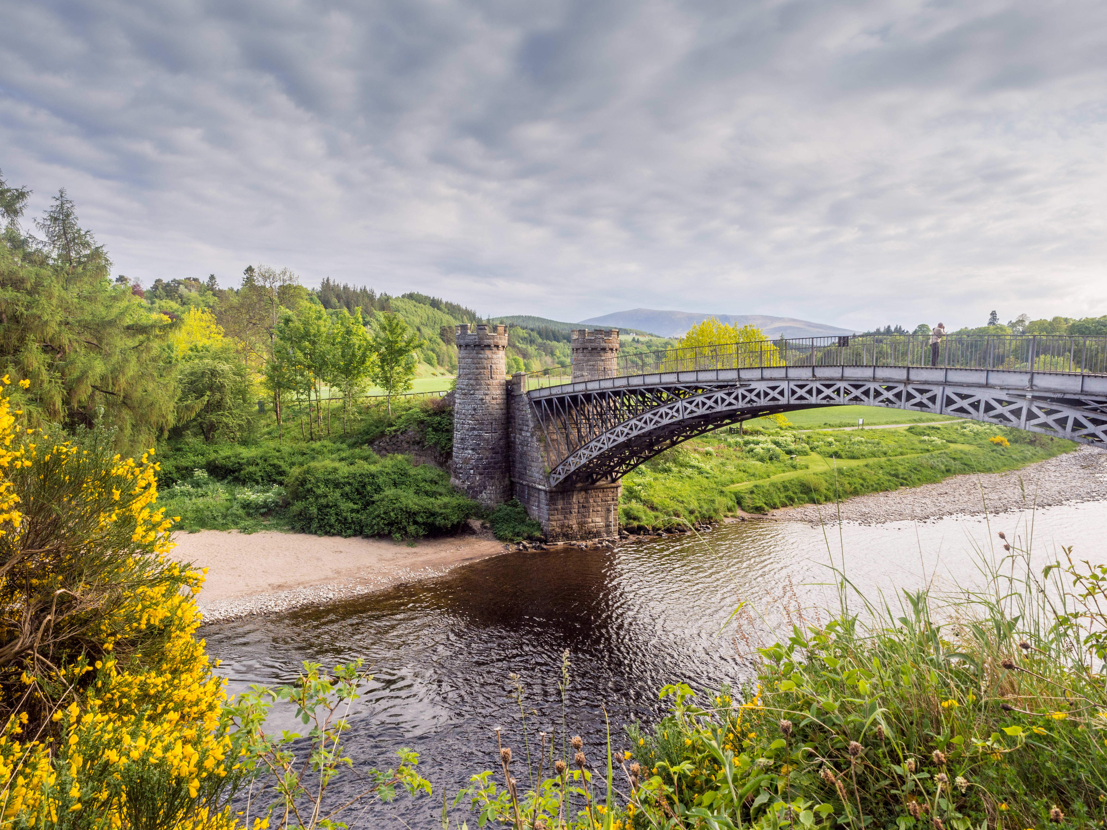 The old disused Craigellachie Bridge over the River Spey at Craigellachie, Aberlour, Moray, Scotland, UK