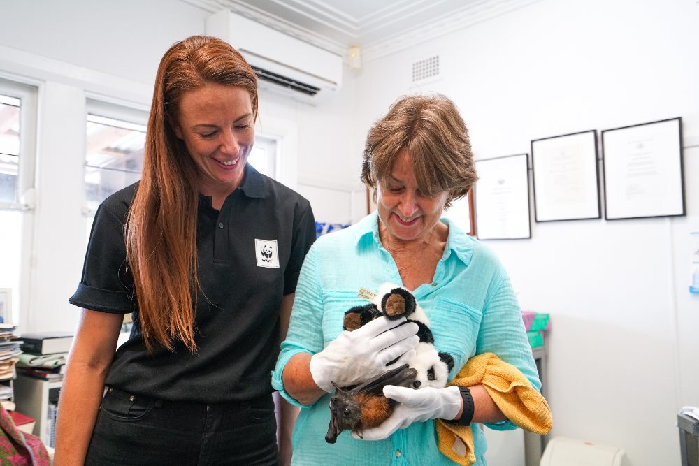 Abigail Sexton and Anne Cherry with Jack= a flying fox bat in care at Milton Village