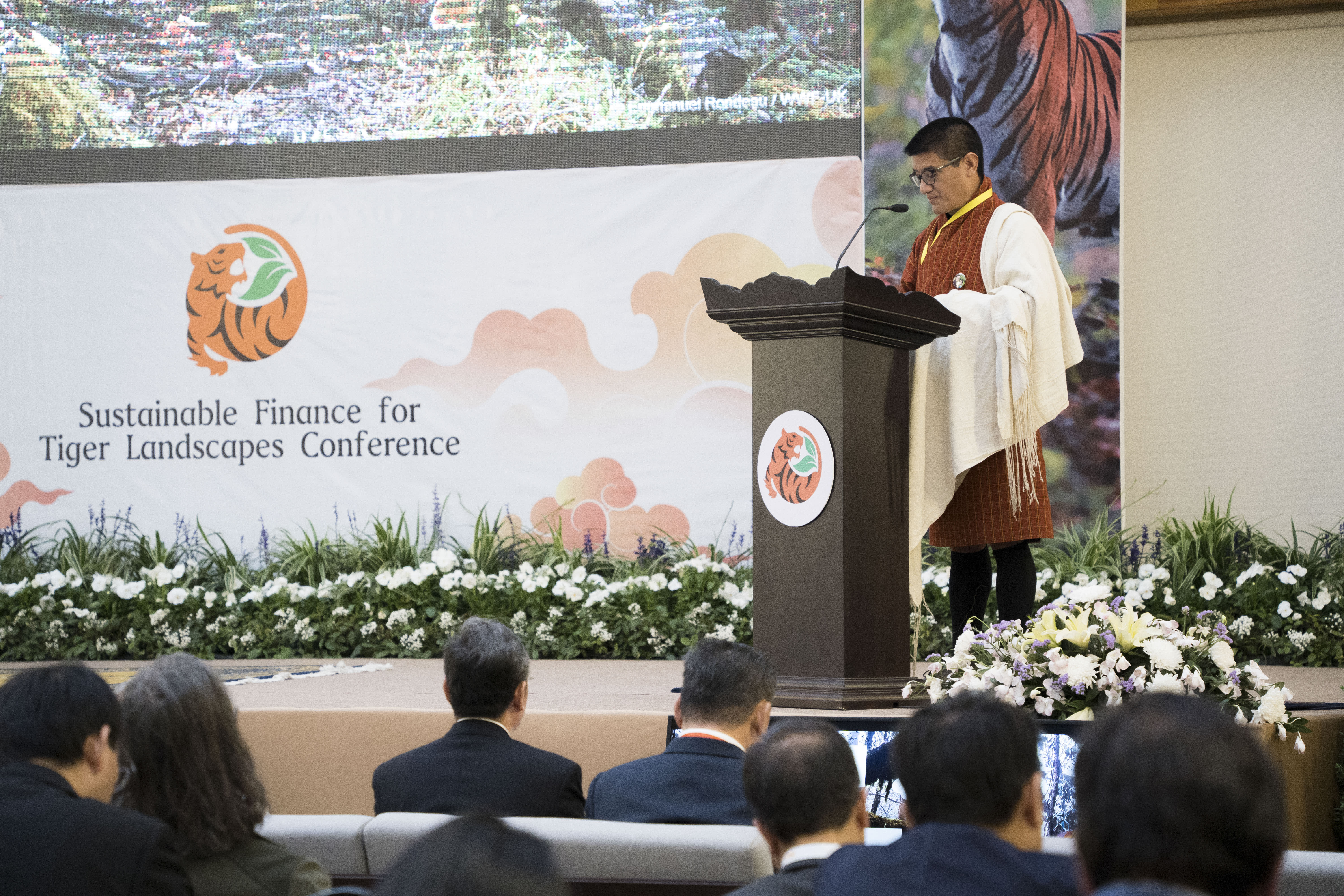 Chimi Rinzin, Country Director of WWF Bhutan, speaks at the Sustainable Finance for Tiger Landscapes Conference, Bhutan.