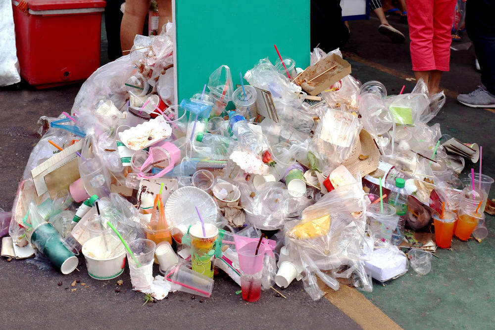 A large pile of plastic garbage on the ground.