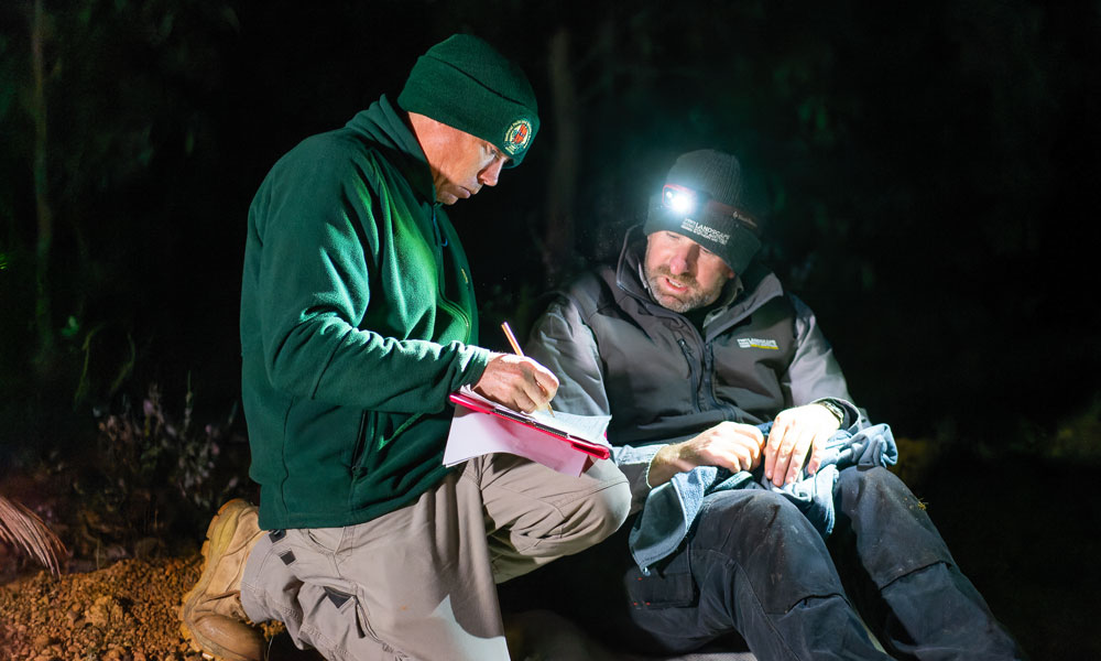 Aaron Smith and Derek Sandow trap bettongs in Manjimup= WA