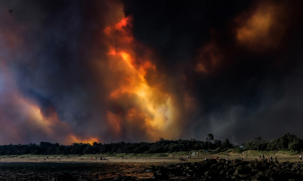 View of bushfire from NSW Broulee Beach= Australia= December 2019