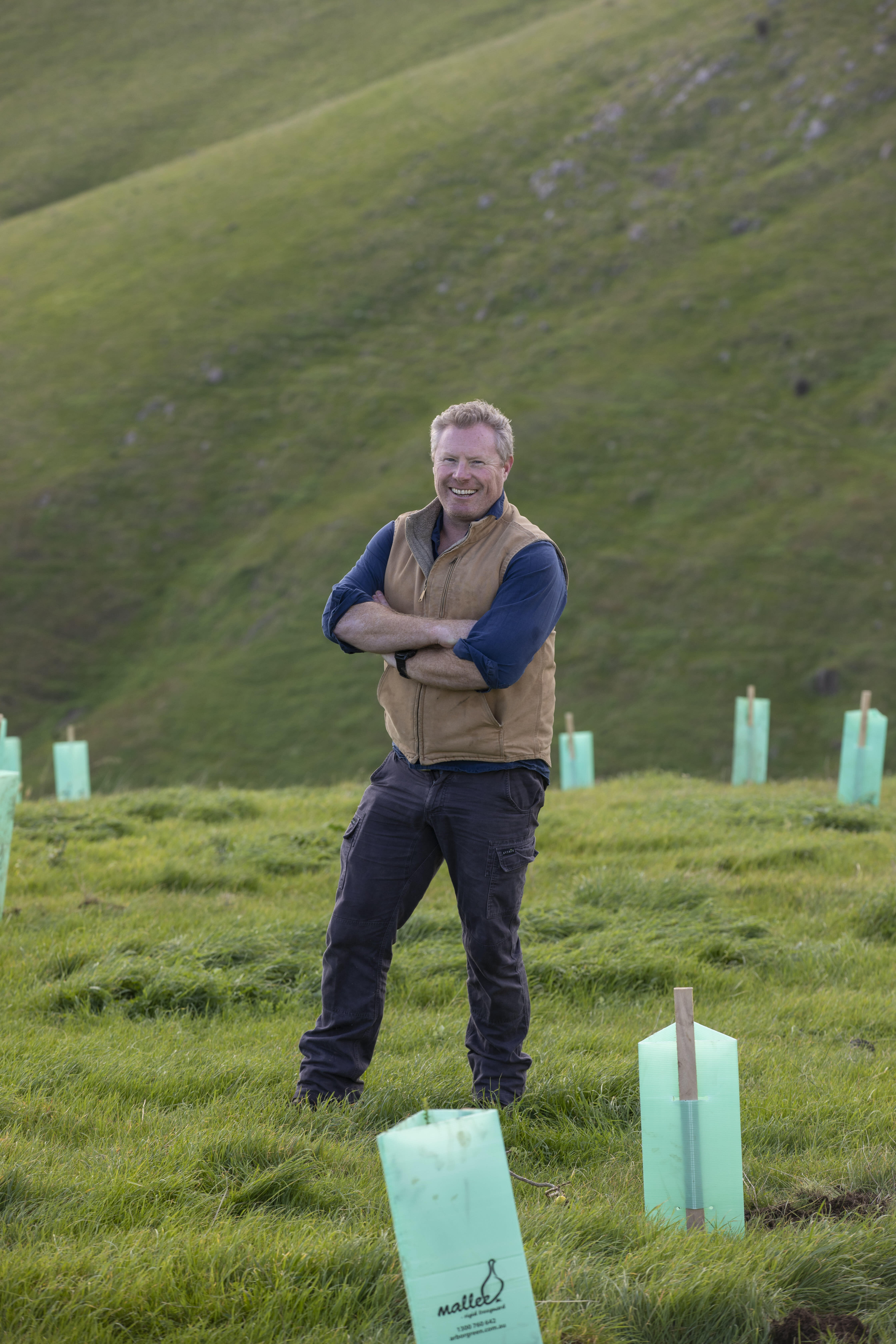 Ed Vercoe, Olive and Cattle Farmer Ed Vercoe among the new sheoak plantings at Carrickalinga.