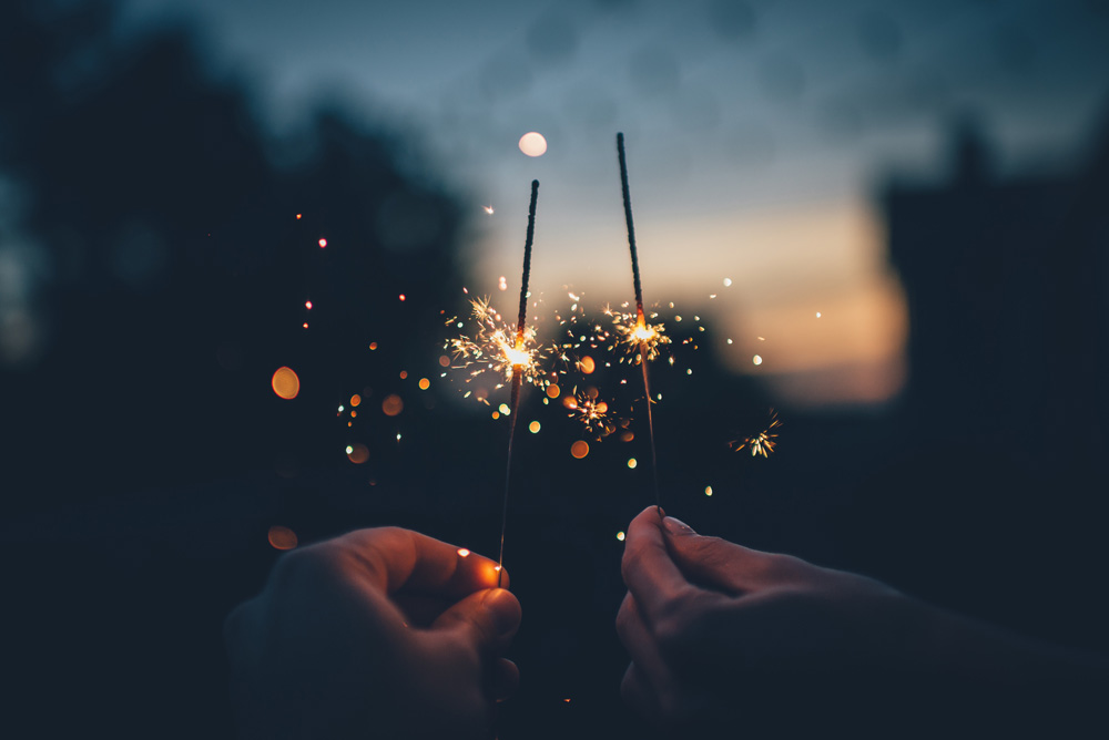 New Year's sparklers by Ian Schneider on Unsplash