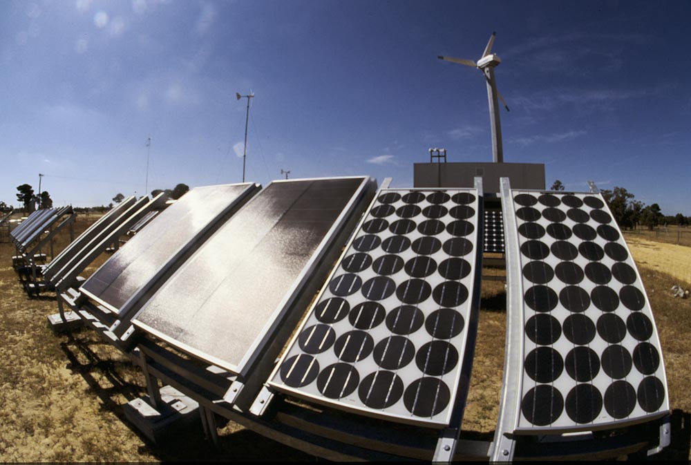 Solar panels and wind turbines at a renewable energy research station in Perth= Western Australia