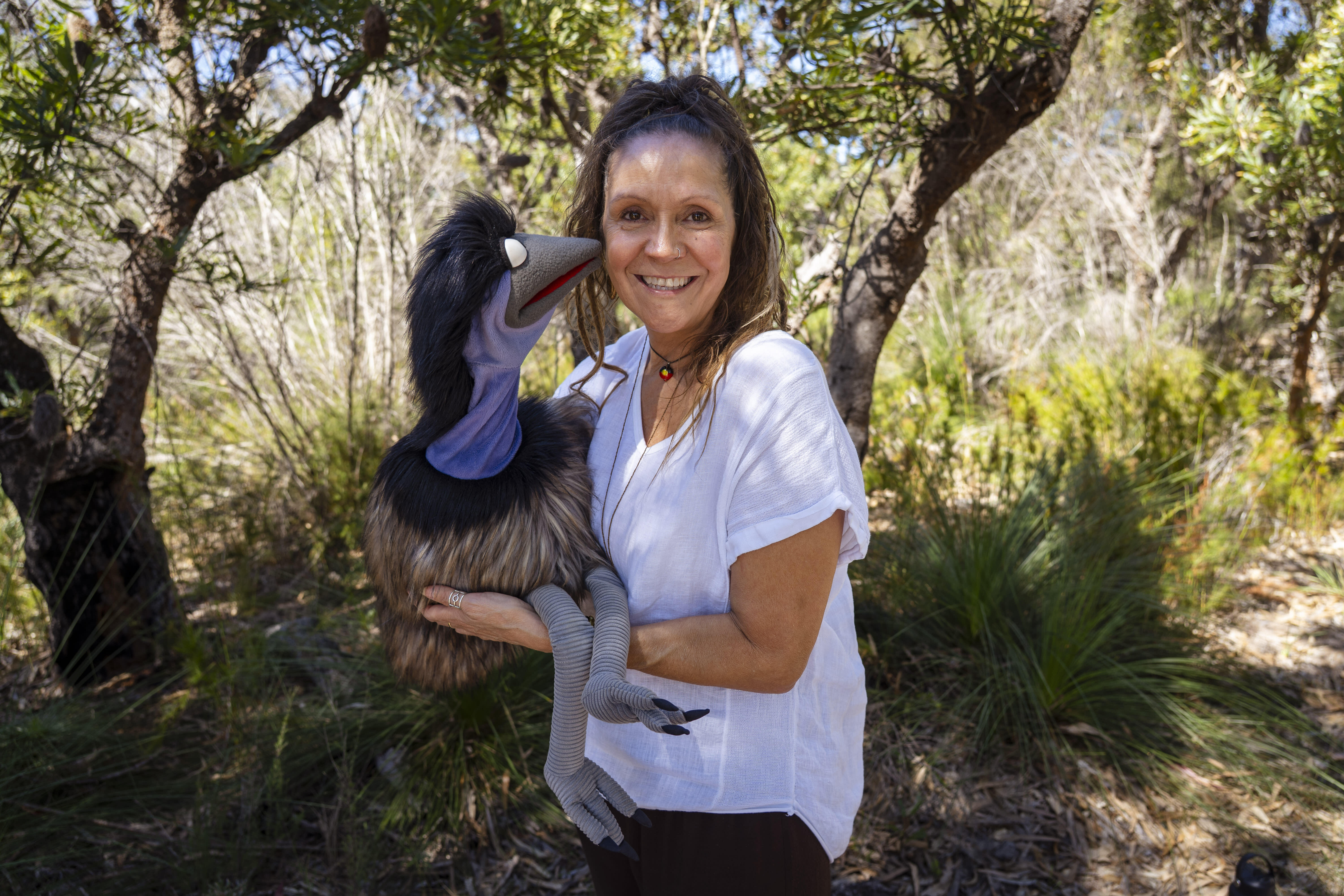 Aunty Sharron mirii Bell, proud Gamilaraay and Wiradjuri woman, children’s performer and educator with Dinawan the Emu (Emu) **dinawan is emu in wiradjuri language**
