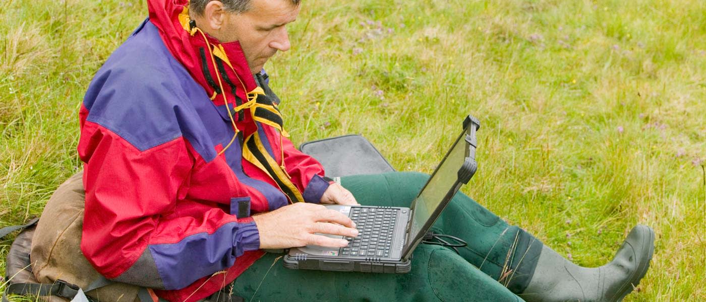 Dr Jeff Warburton of Durham University researching erosion patterns in Cumbria, UK