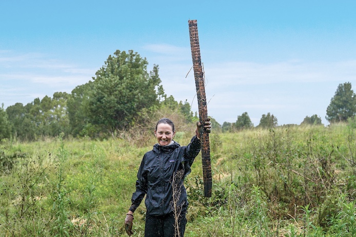 Plant holder stack showing how many trees were planted that day