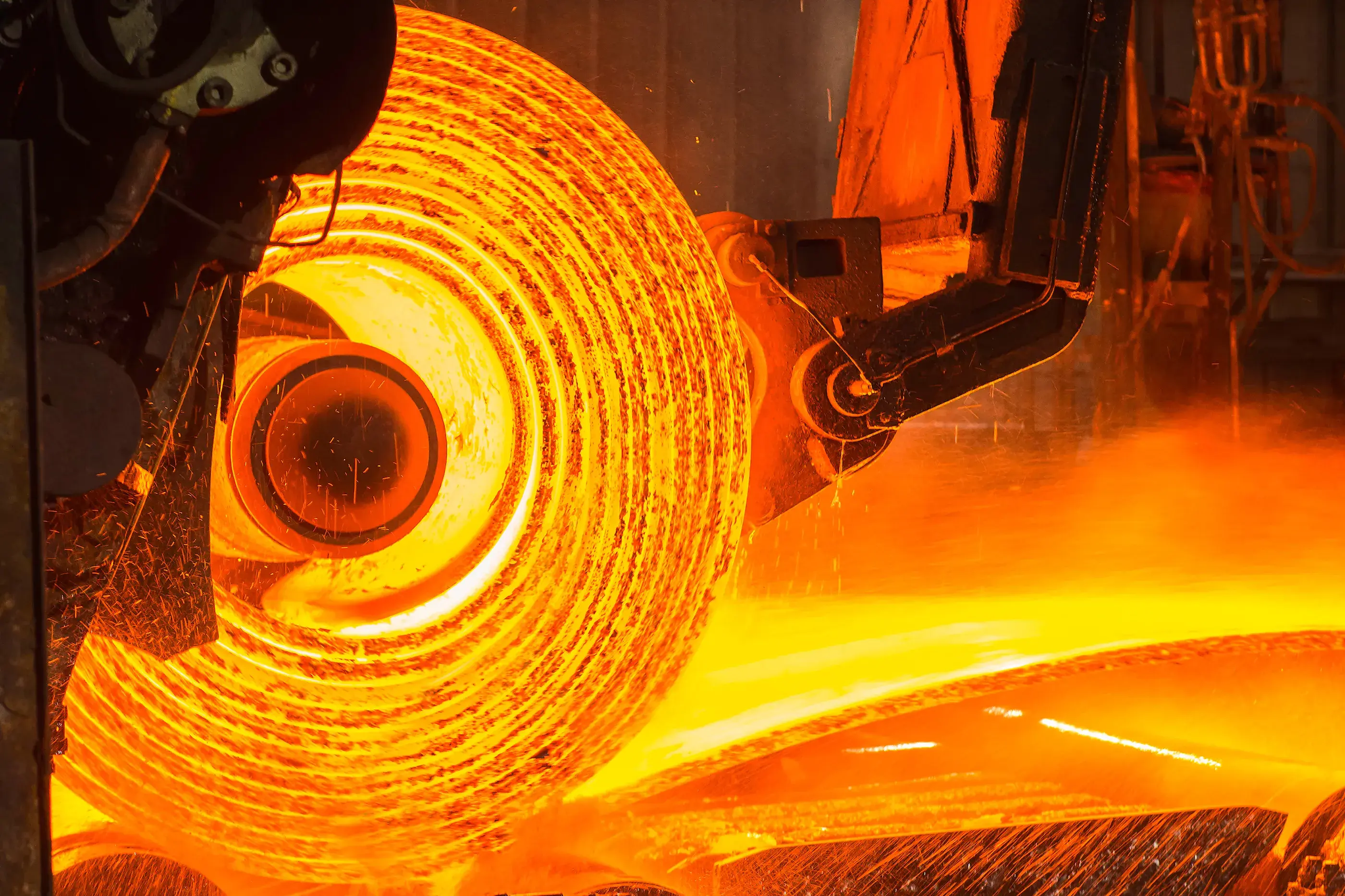 Stock image of a roll of hot metal on the conveyor belt. © Shutterstock / Smile-Sky Ztudio / WWF
