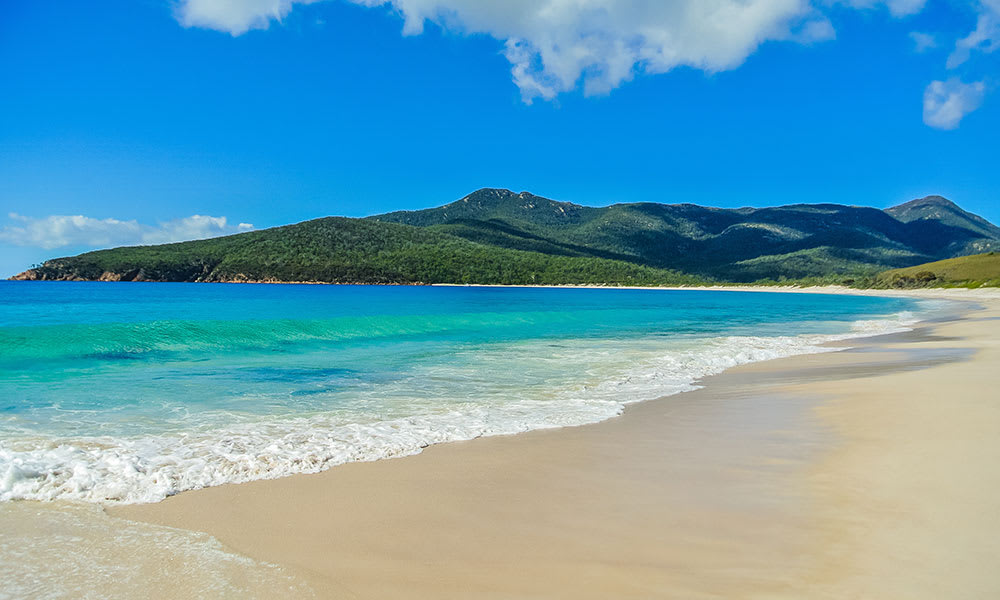 Pristine white sand at Wineglass Bay, Freycinet National Park, Tasmania.