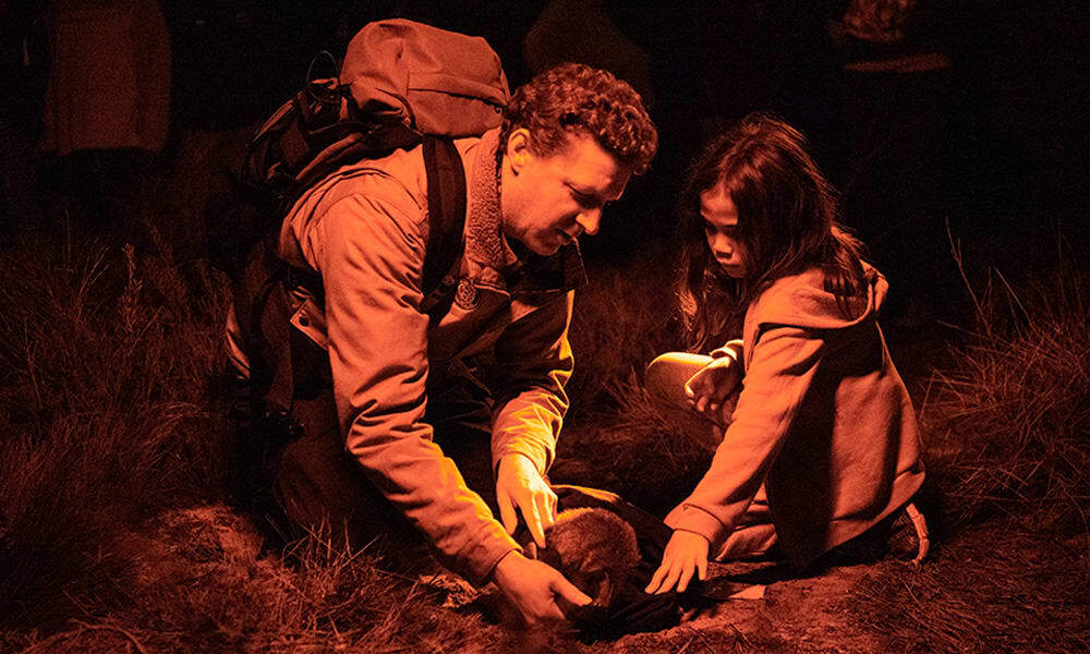 WWF-Australia's Rob Brewster and Narungga youth release a bettong on Guuranda (Yorke Peninsula)